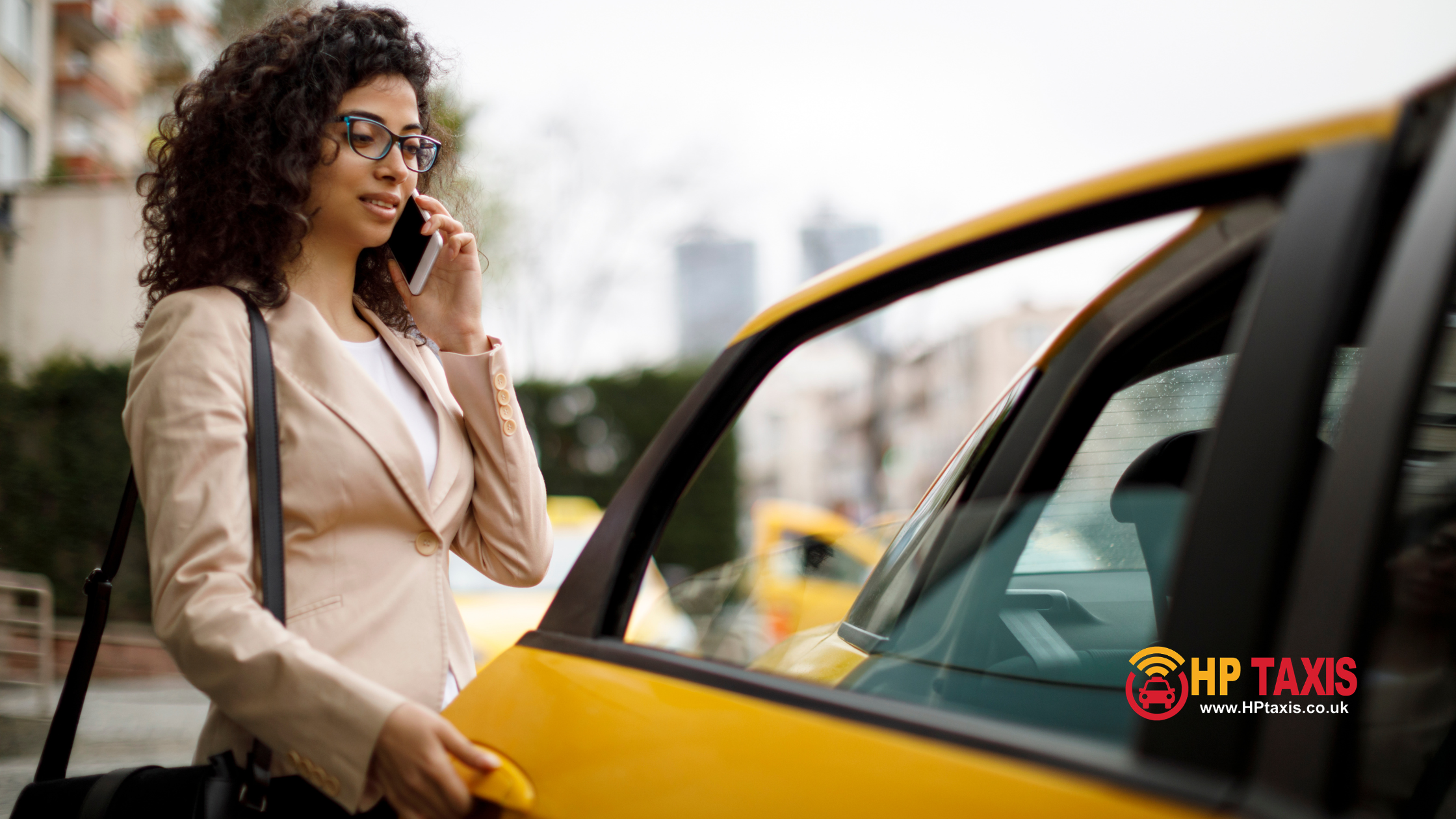 Business traveler riding in a Haywards Heath taxi to the airport